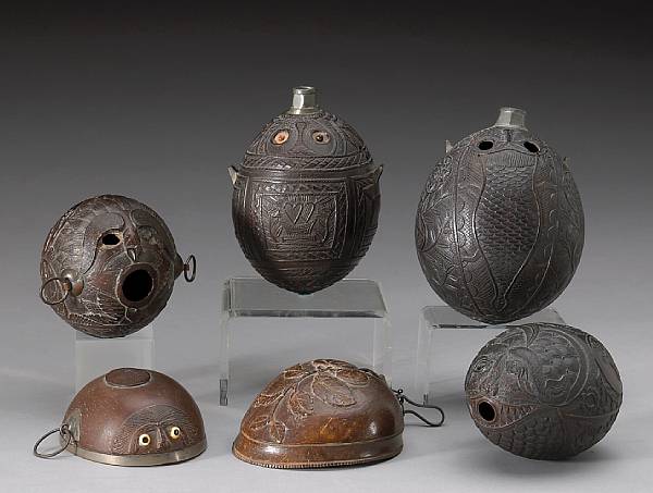 Appraisal: Four European coconut 'bugbear' flasks first half th century Each