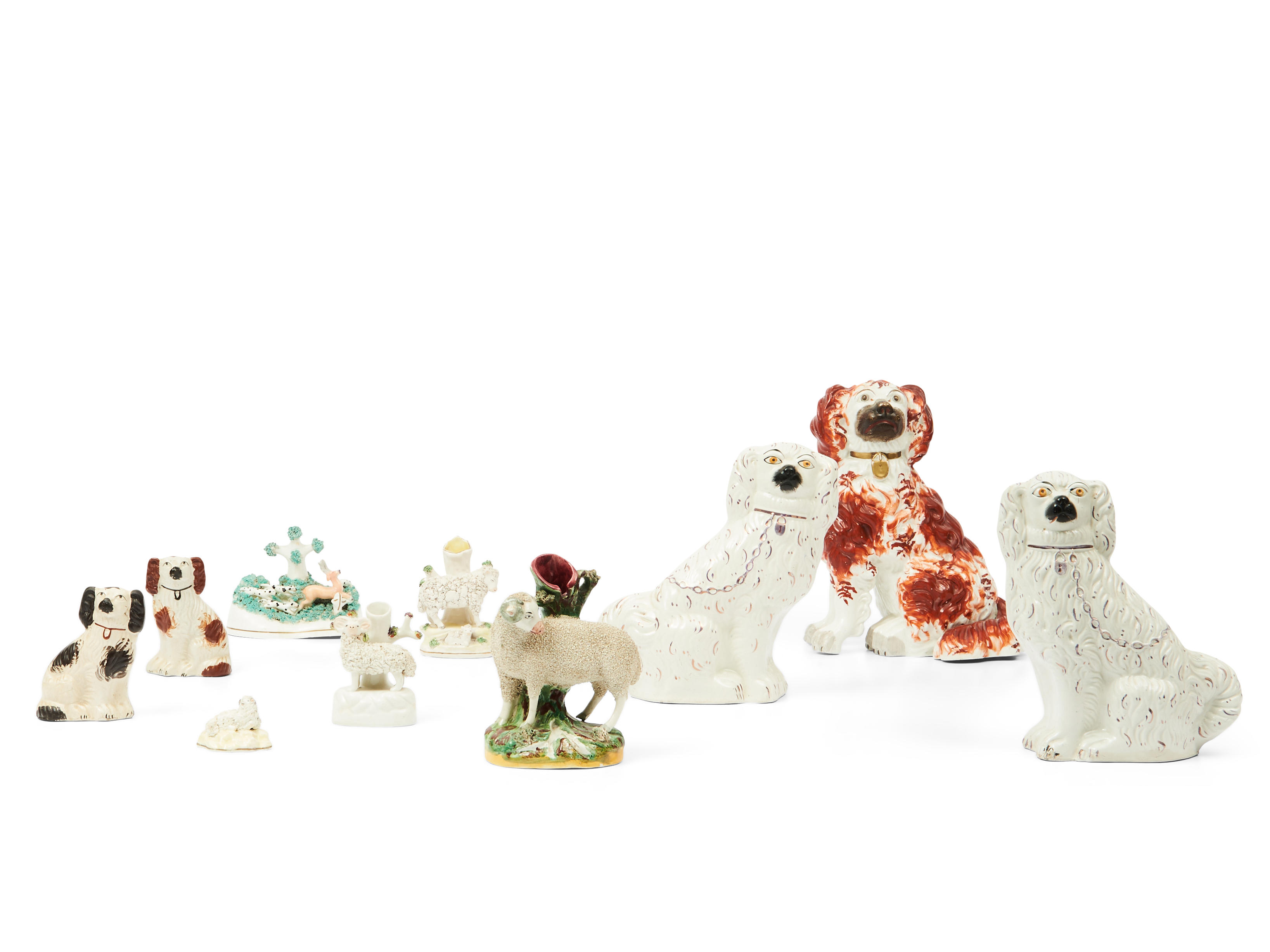 Appraisal: Group of Staffordshire Pottery Animals five spaniels a miniature figure