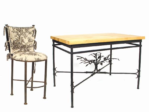 Appraisal: A wrought metal and butcher block center table After a