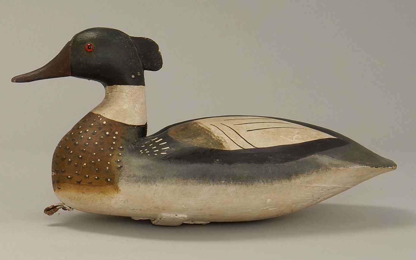 Appraisal: HOLLOW-CARVED RED-BREASTED MERGANSER DRAKEEarly th CenturyBy Charles Parker of Parkerstown