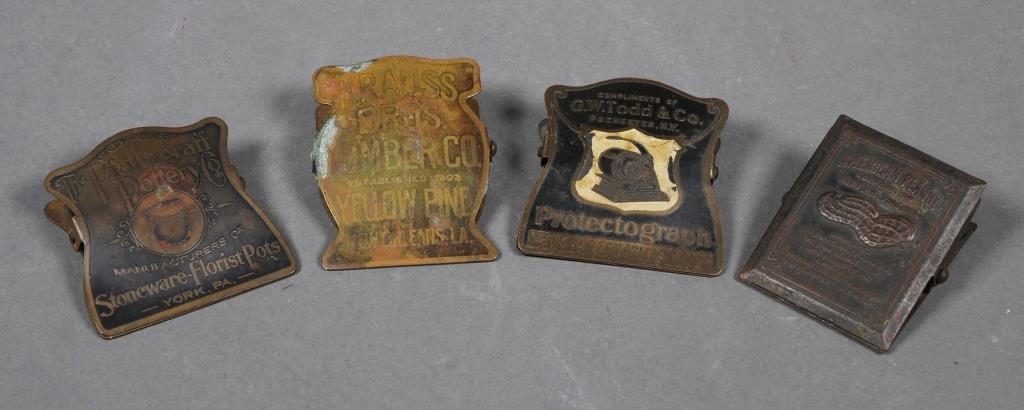 Appraisal: Four antique advertising metal brass paper binder clips American Peanut