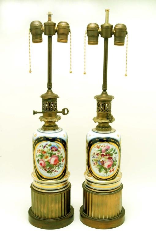 Appraisal: A pair of electric lamps with hand painted porcelain bodies