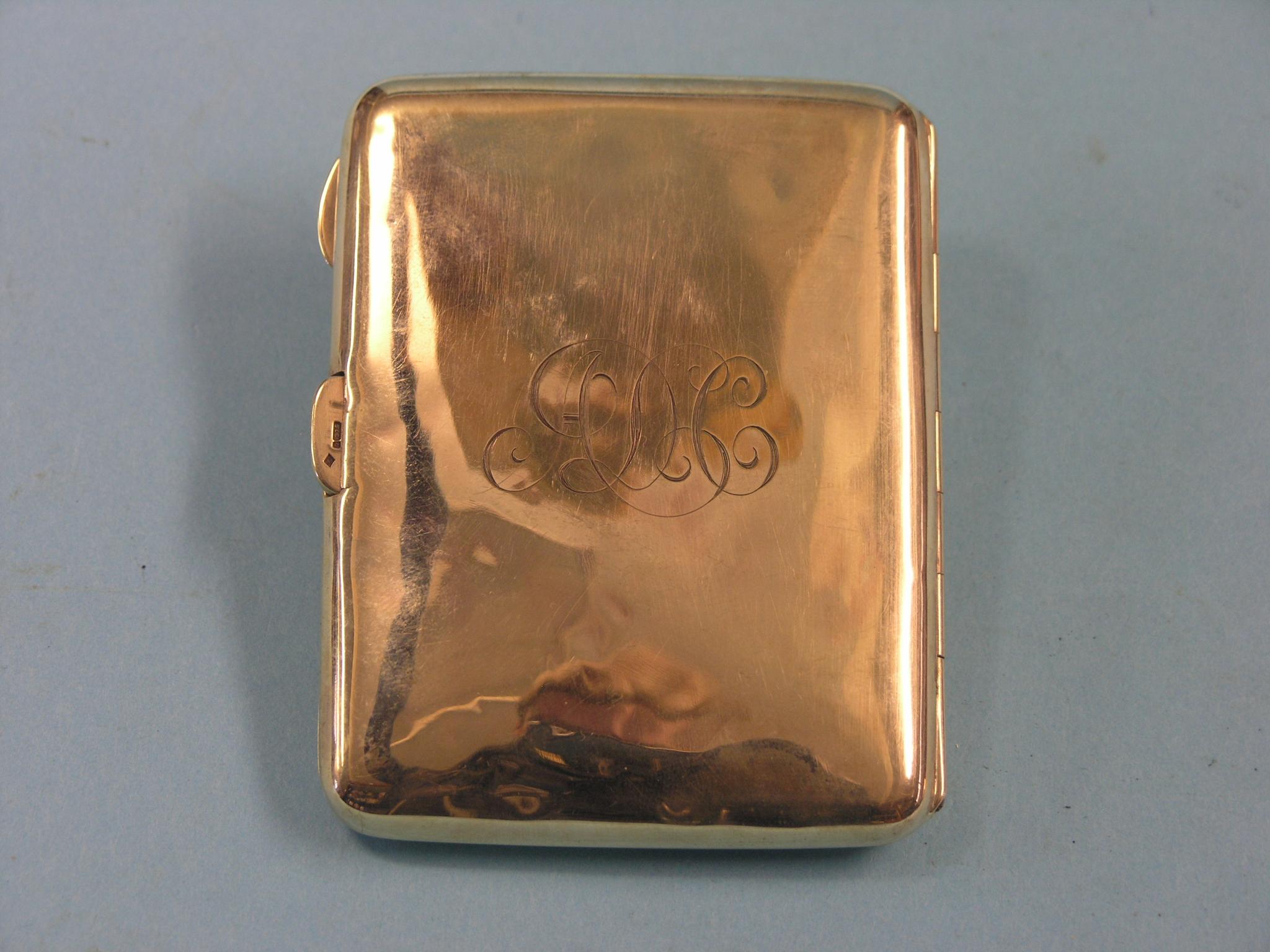 Appraisal: A ct gold cigarette case monogrammed grams including cigarette restraint