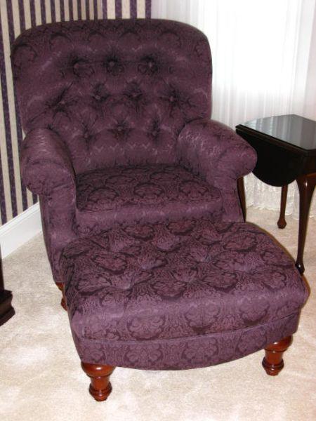 Appraisal: Upholstered Arm Chair and Ottoman button and tufted back and