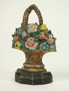 Appraisal: DOORSTOP - Basket of flowers painted cast iron doorstop Circa