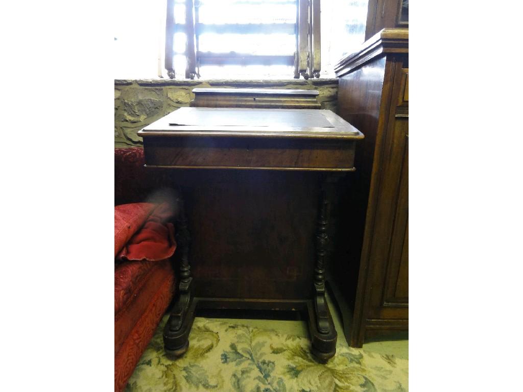 Appraisal: A Victorian walnut and figured walnut Davenport of usual form