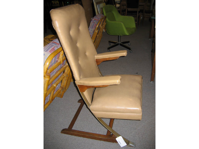 Appraisal: LAZY-D PLATFORM ROCKER tufted brown vinyl with wood and metal