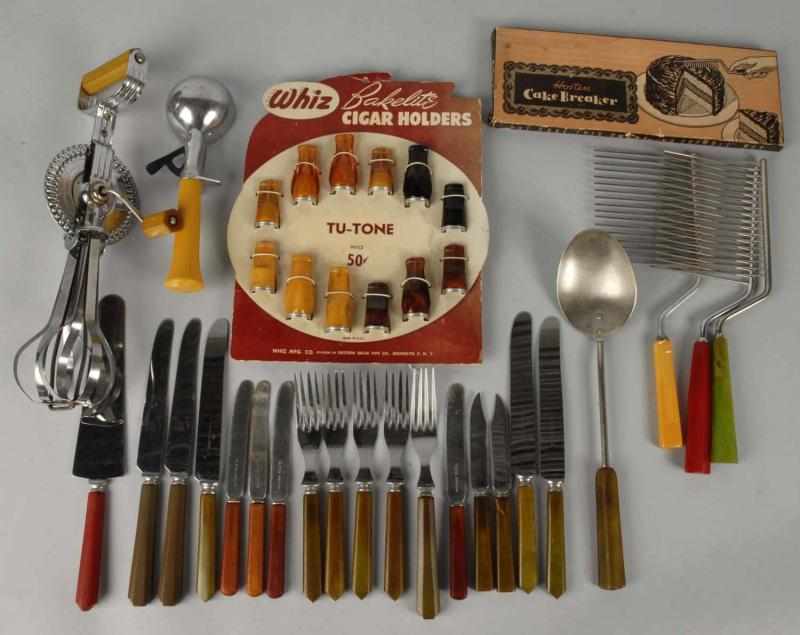 Appraisal: Large Lot of Bakelite Pieces Description Over pieces include flatware