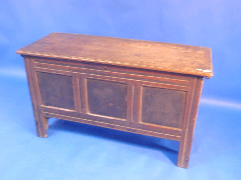 Appraisal: A thC oak coffer with flamed top and three flamed