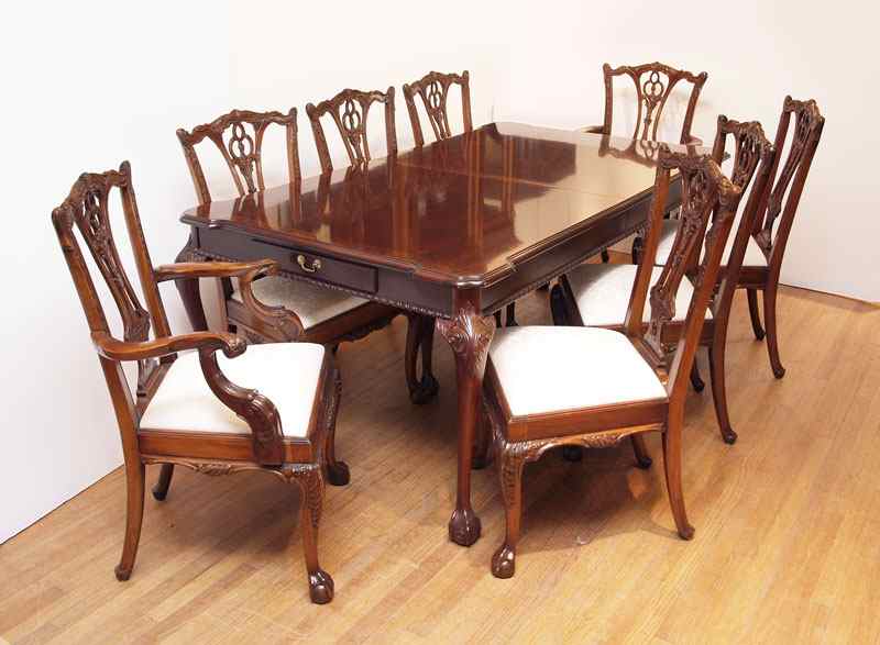 Appraisal: LINK TAYLOR MAHOGANY DINING TABLE AND ARDLEY HALL CHAIRS Chippendale