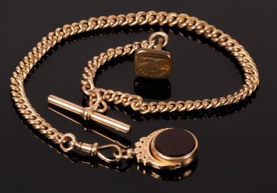 Appraisal: A ct gold Albert chain with T-bar attachment and clip