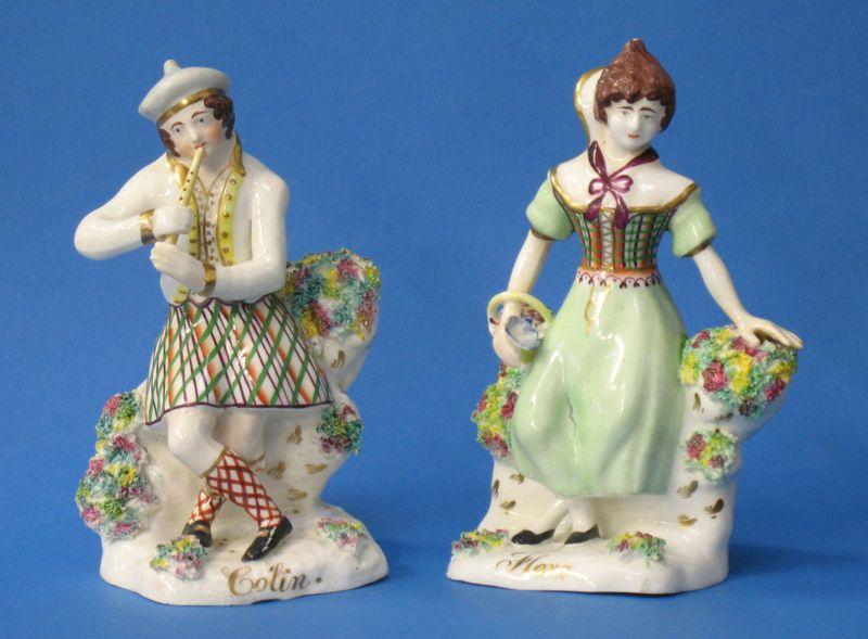 Appraisal: A PAIR OF STAFFORDSHIRE POTTERY FIGURES Flora and Colin the