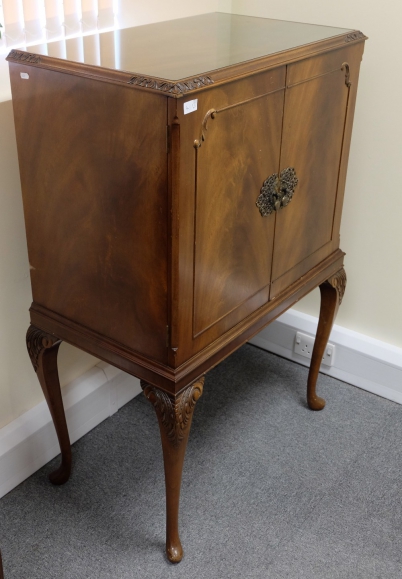 Appraisal: Reproduction Drinks cabinet on Queen Anne legs x x cm