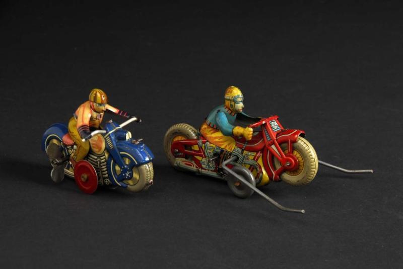 Appraisal: Lot of Tin Motorcycle Wind-Up Toys Description Japanese Both are