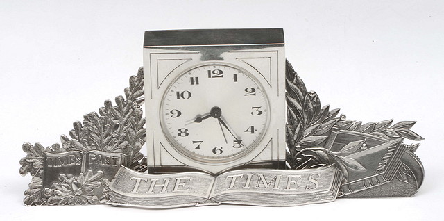 Appraisal: A SILVER CASED TIMES NEWSPAPER DESK CLOCK by Thomas Fattorini