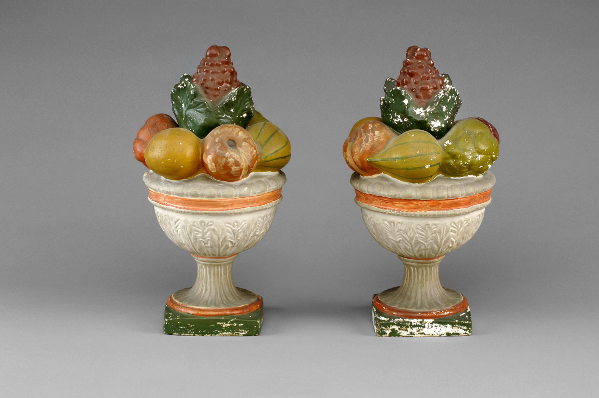 Appraisal: PAIR OF AMERICAN CHALKWARE FRUIT FILLED COMPOTES IN POLYCHROME PAINT