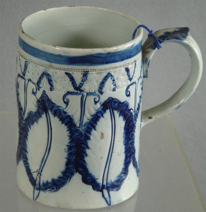 Appraisal: Blue decorated Leeds mug with featheredge embossed leaf pattern design