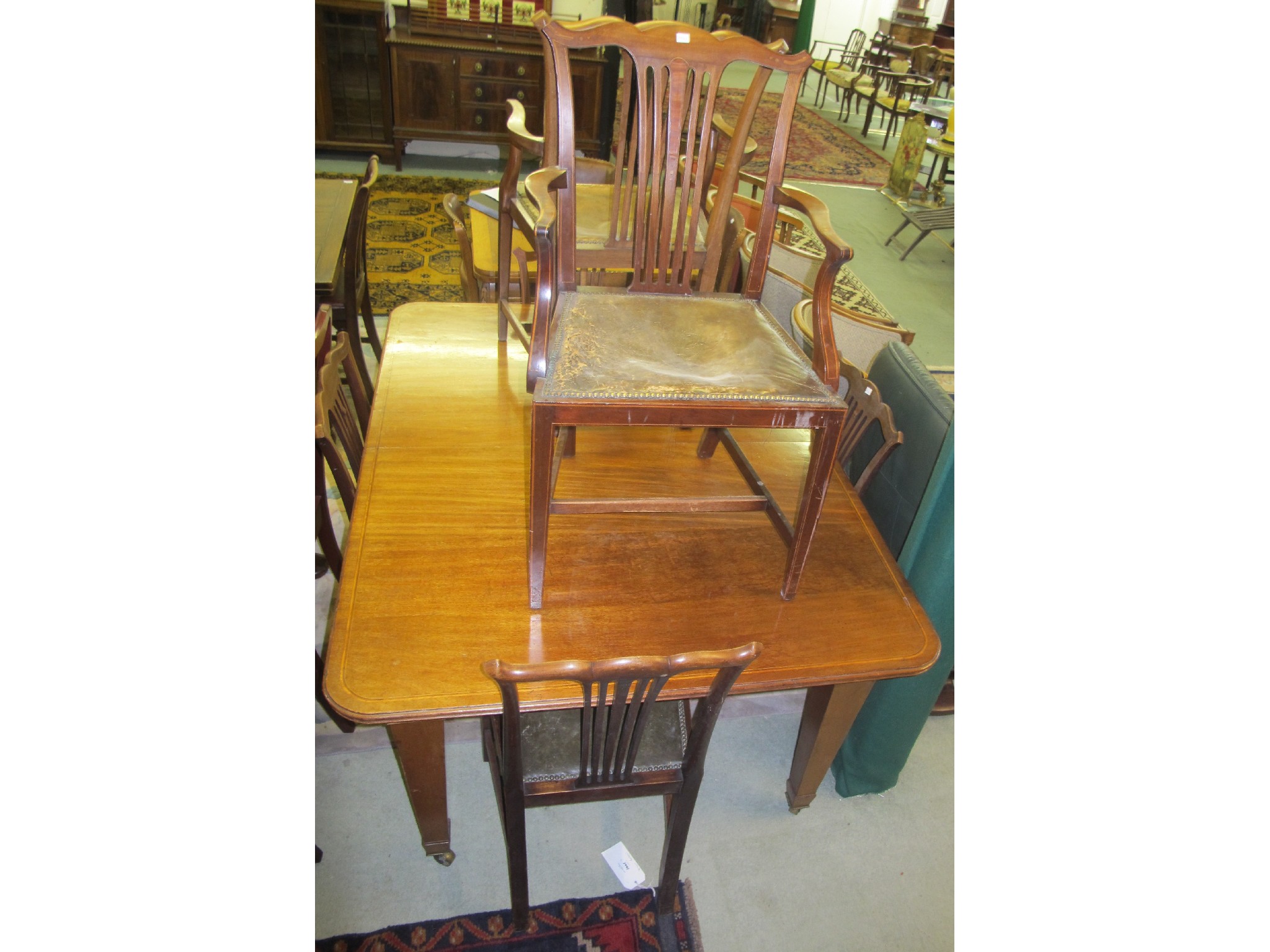 Appraisal: Edwardian mahogany dining table and six chairs