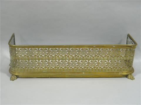 Appraisal: REGENCY STYLE PIERCED BRASS FIRE FENDER h w d in