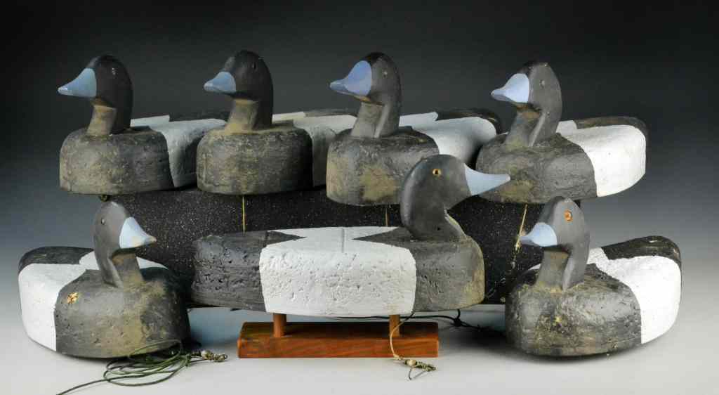 Appraisal: Cork Duck DecoysPrimitive painted matching ducks with glass eyes ''