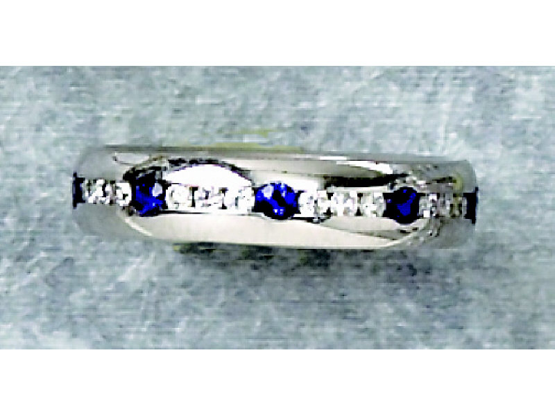 Appraisal: SAPPHIRE AND DIAMOND RING k white gold channel set ring