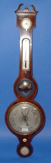 Appraisal: A thC mahogany wheel barometer with hygrometer thermometer convex mirror