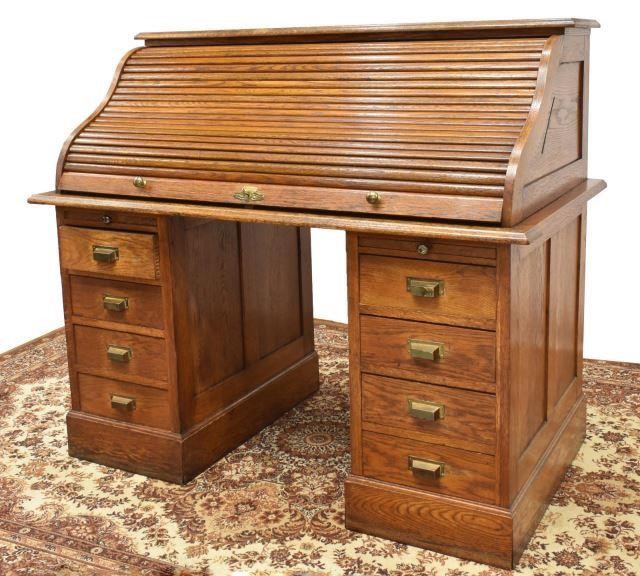 Appraisal: Oak roll-top desk M L Thorengaard early th c tambour