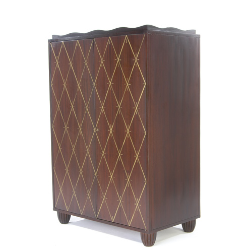 Appraisal: BAKER Mahogany two-door entertainment unit painted with gold treillis pattern