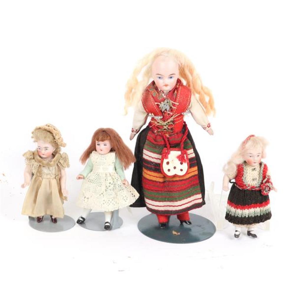 Appraisal: FOUR GERMAN ALL BISQUE MINIATURE DOLLHOUSE CHILD DOLLS WITH PAINTED