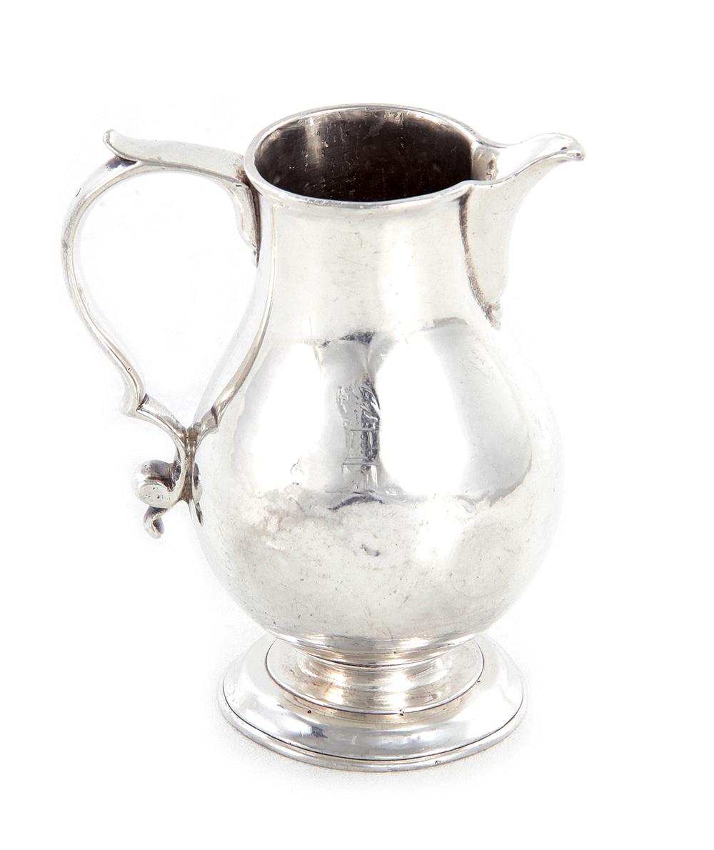 Appraisal: George I sterling creamer London dated baluster form sparrow's-beak spout