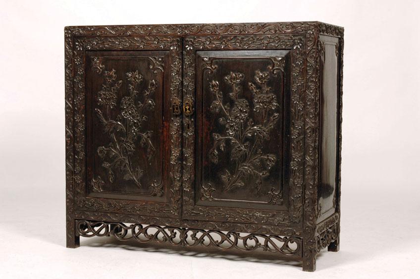 Appraisal: A CHINESE HARDWOOD CUPBOARD with a rectangular floating panel top