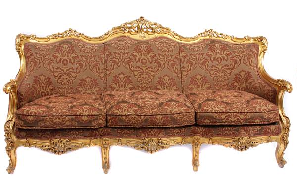 Appraisal: A Louis XV style carved and upholstered sofa height in