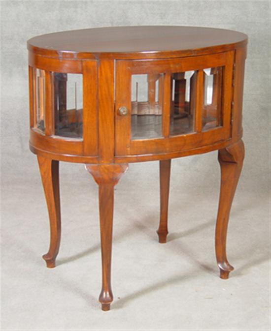 Appraisal: Oval Display Stand Mahogany and hard woods Waist surrounded with