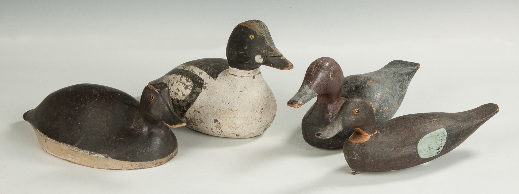 Appraisal: Carved Painted Duck Decoy Early th cent Glass eyes