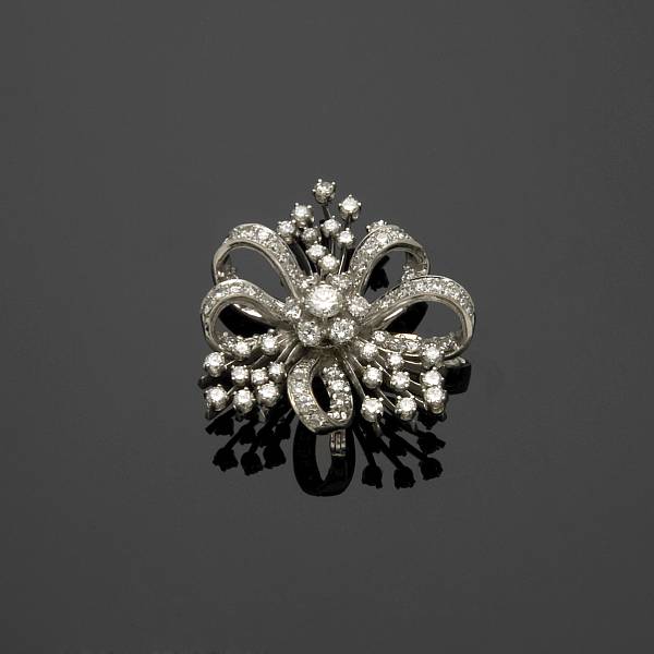 Appraisal: A diamond brooch-enhancer in a bow motif estimated total diamond