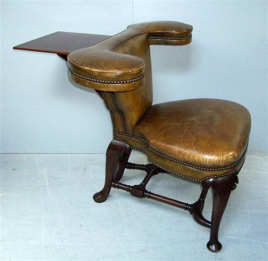 Appraisal: George III style mahogany and green leather cock fighting chair