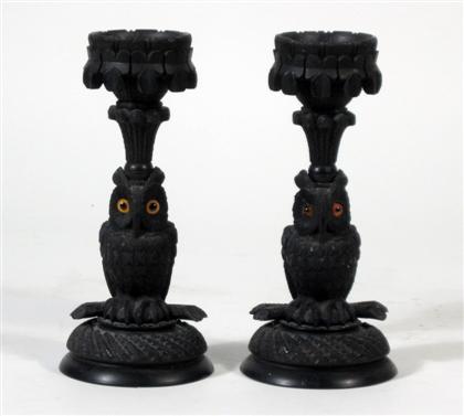 Appraisal: Pair of Irish carved bogwood candlestickslate th century