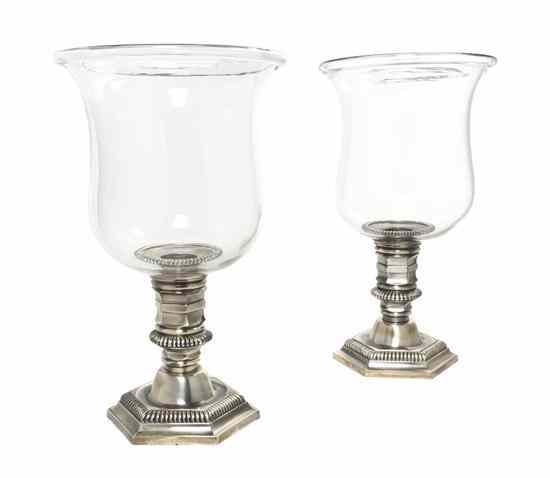 Appraisal: A Pair of Continental Silverplate Candlesticks of hexagonal form issuing