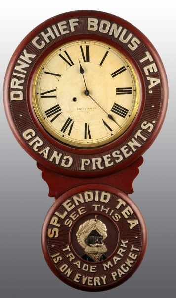 Appraisal: Chief Bonus Tea Baird Clock Description This solid bottom door