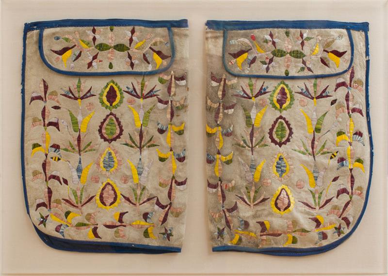 Appraisal: PAIR OF PLAINS EMBROIDERED HIDE LEGGINGS Now mounted in plexiglass