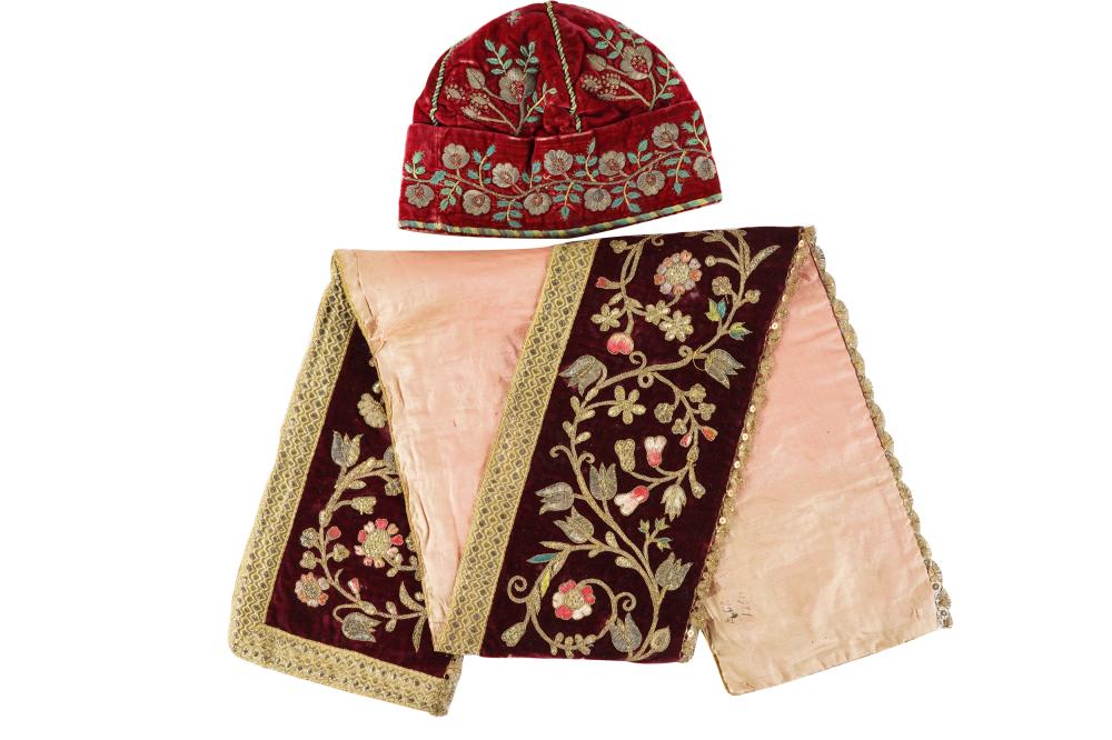 Appraisal: TWO EMBROIDERED TEXTILEScomprising a th century sleeping cap and European