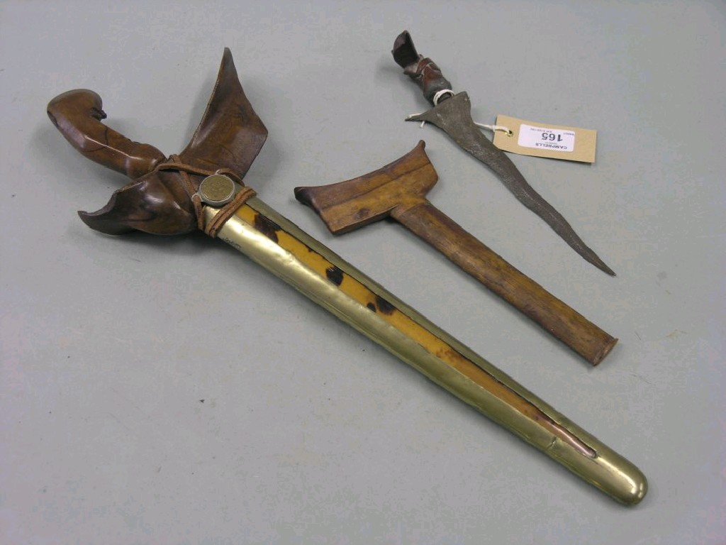 Appraisal: Two Kris daggers each within sheath and in maximum length