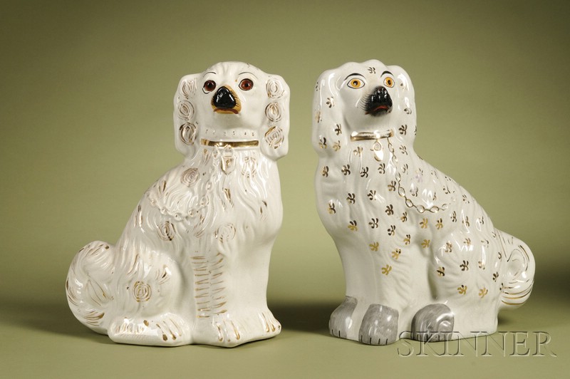 Appraisal: Two Victorian Staffordshire Pottery Spaniels England th century each white