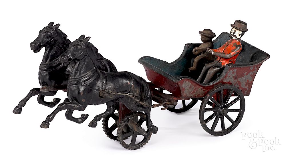 Appraisal: Carpenter cast iron horse drawn pleasure cart Carpenter cast iron