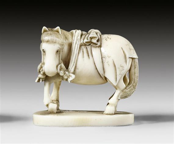 Appraisal: AN IVORY NETSUKE OF A HORSE SIGNED MINZAN Japan th