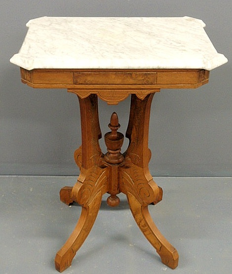 Appraisal: Eastlake walnut occasional table c with a shaped marble top