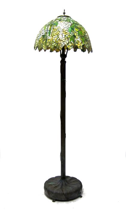 Appraisal: Leaded glass and patinated metal Tiffany-style floor lamp th century