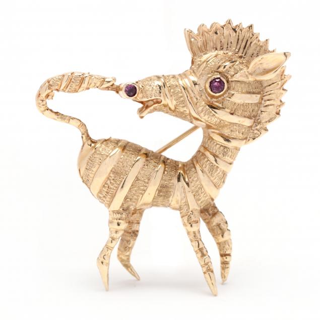 Appraisal: WHIMSICAL GOLD AND RUBY ZEBRA BROOCH The whimsical zebra with