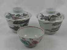 Appraisal: Two Chinese porcelain tea bowls with covers printed red marks