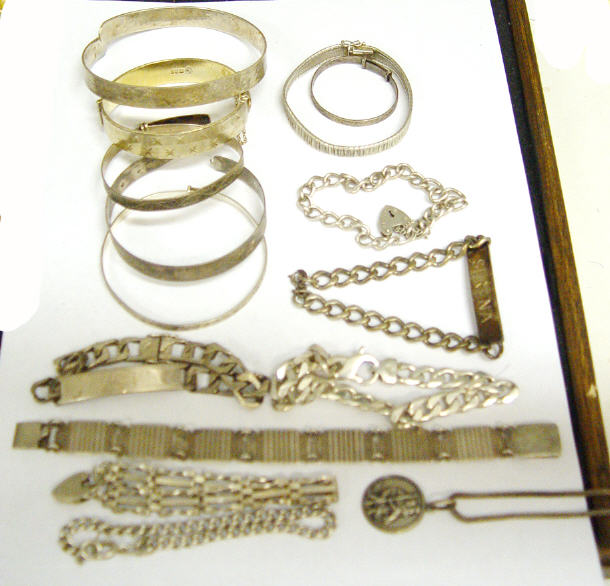 Appraisal: Bag of silver bracelets charm bracelets etc